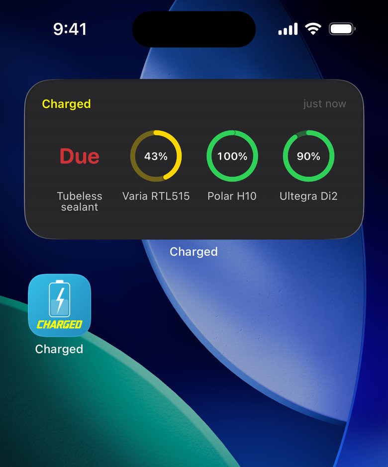 iPhone home screen in dark mode with a medium Charged widget: Tubeless sealant Due in red, Varia RTL515 43% in yellow, Polar H10 100% and Ultegra Di2 90% in green.